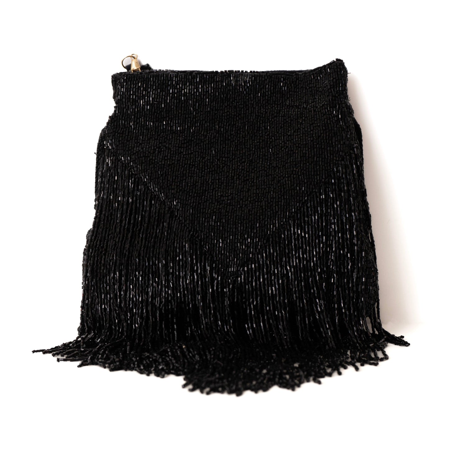 Black fringe bag on a white background