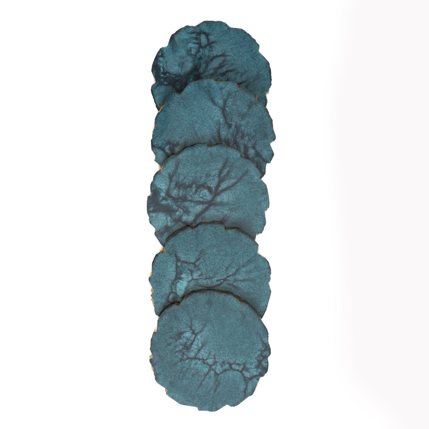 Set of five blue stone coasters on a white background