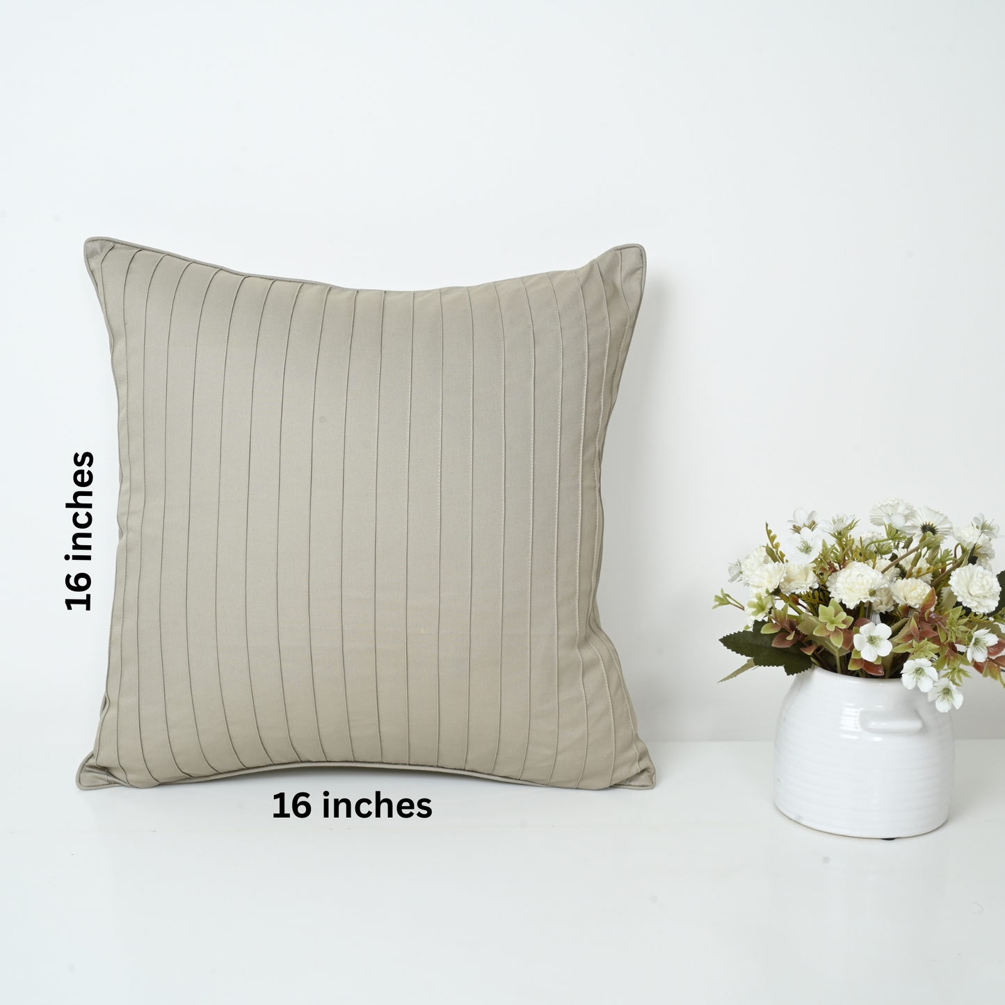 Beige striped pillow with dimensions .