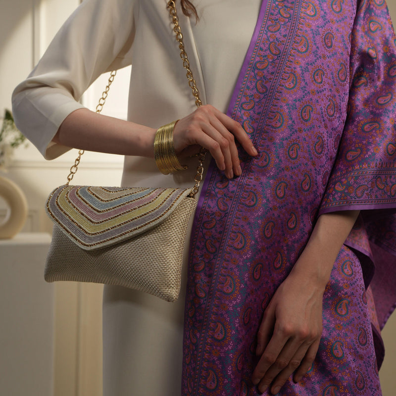 Beige Beads clutch with metal strap