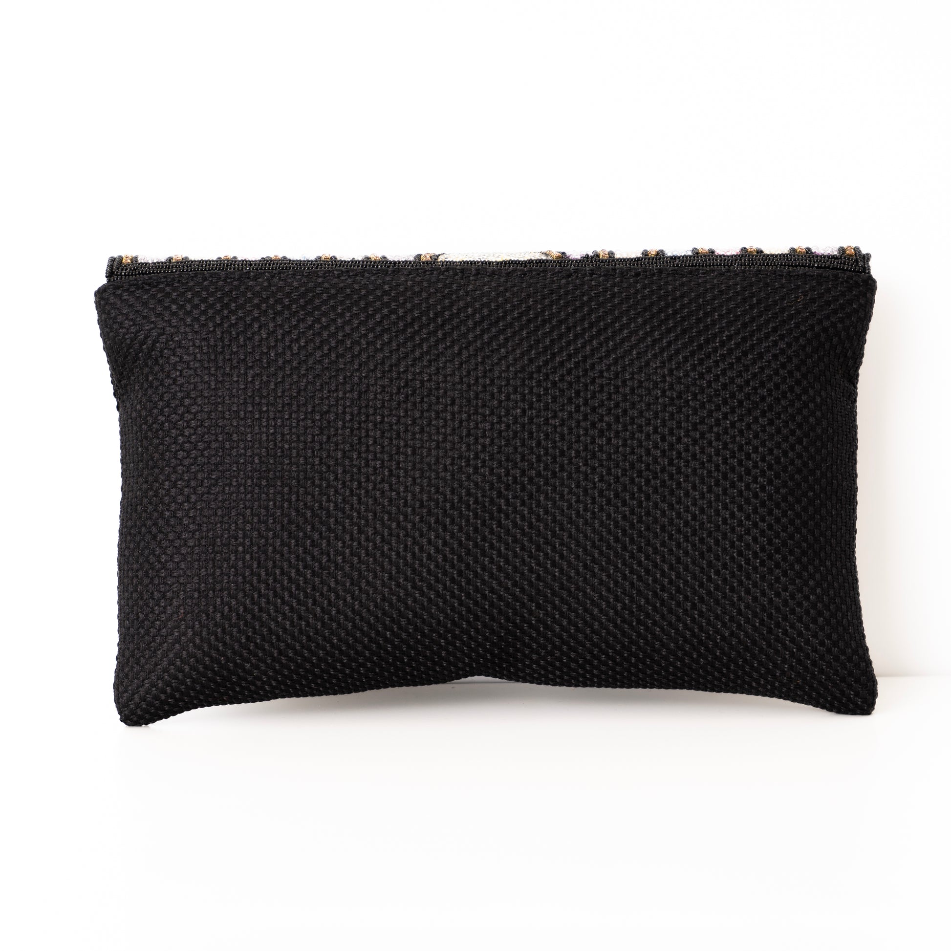 Black textured rectangular pillow on a white background