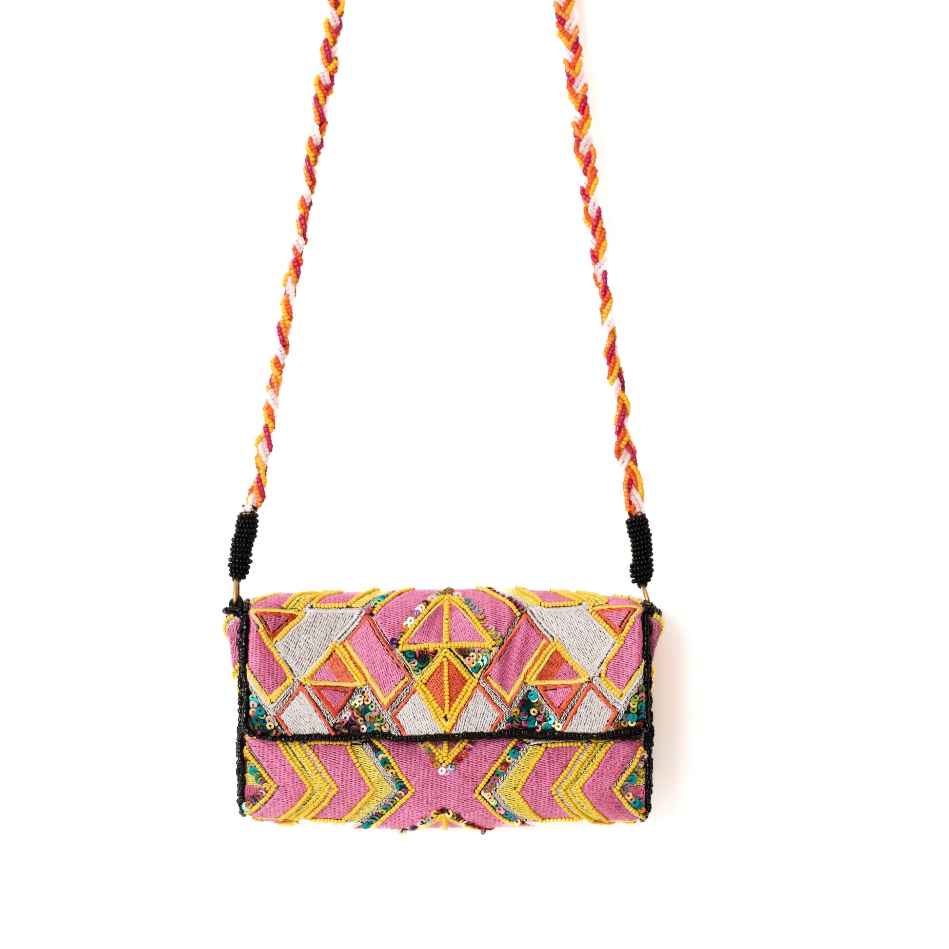 Colorful geometric patterned clutch bag with a strap on a white background
