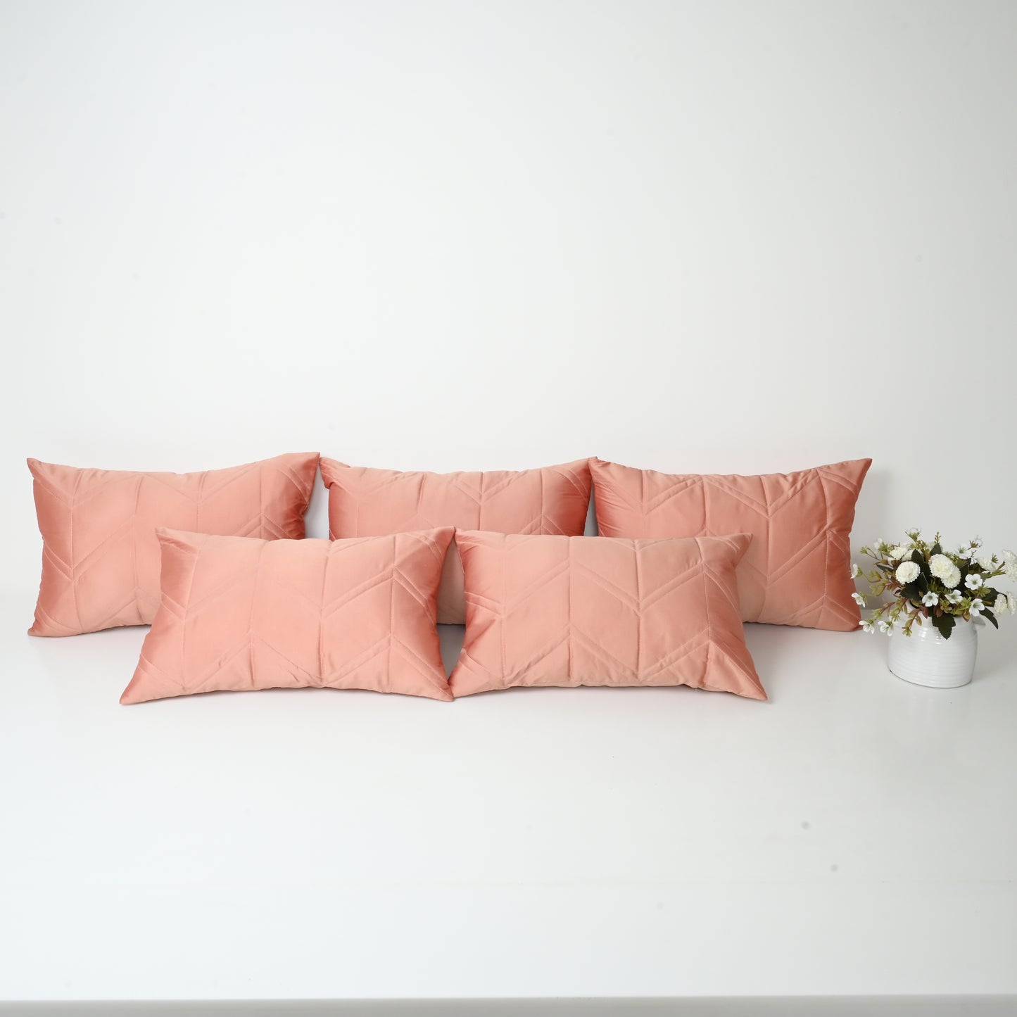 Set of peach pillows.