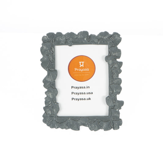 Decorative photo frame with floral design on a white background