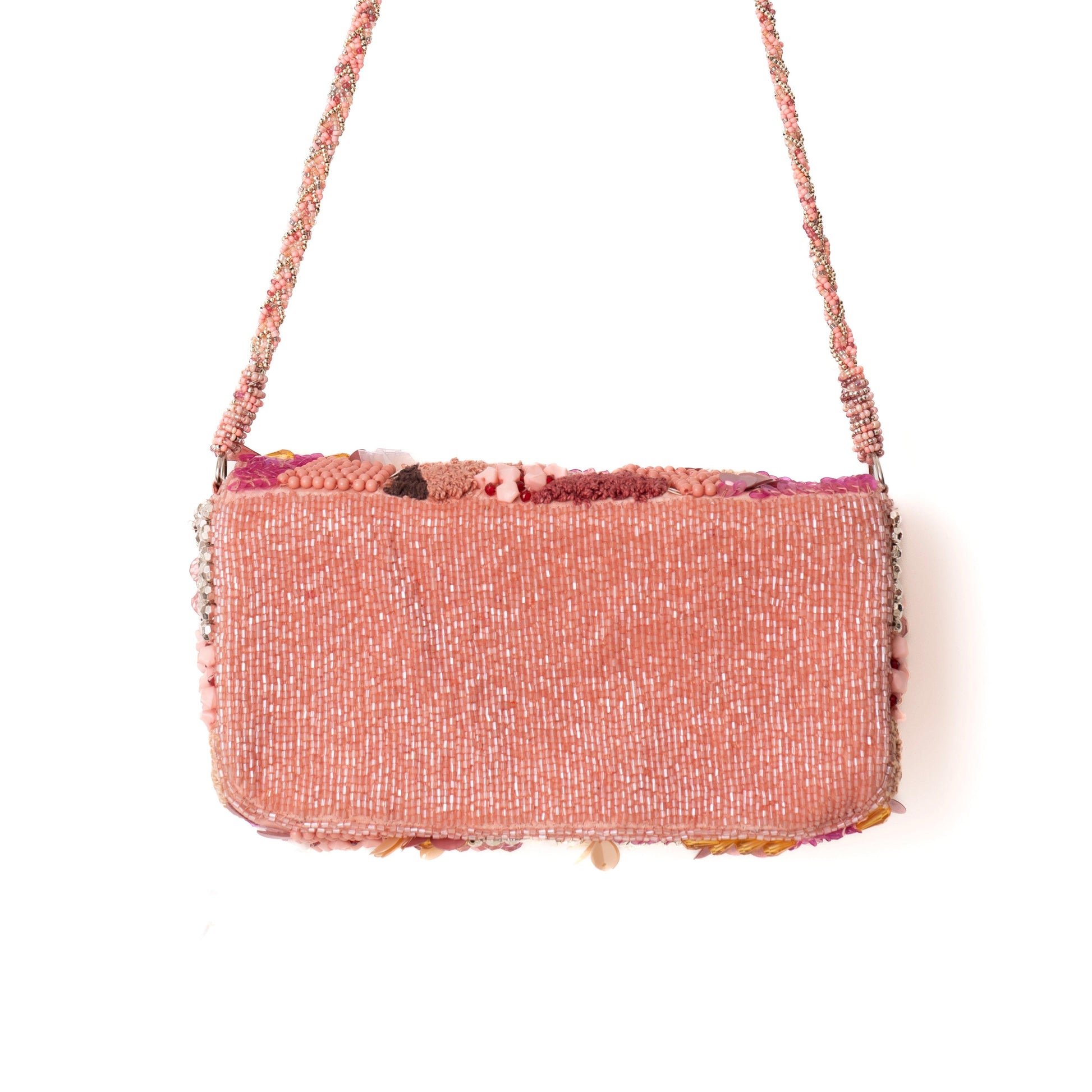 Pink textured handbag with a strap on a white background