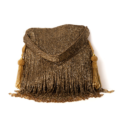 A black hand-embroidered potli bag with fringe detailing.
