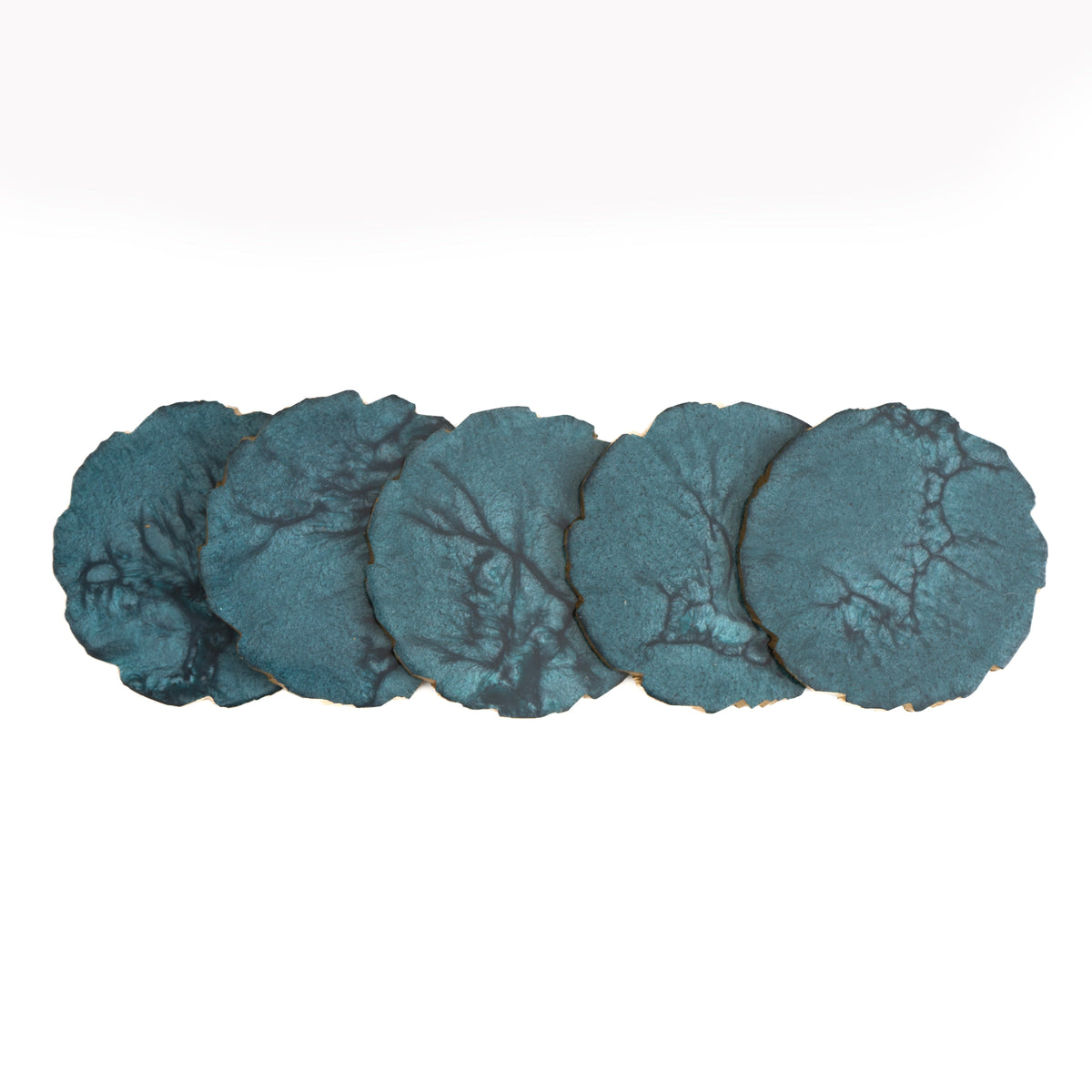 Set of five blue stone coasters on a white background