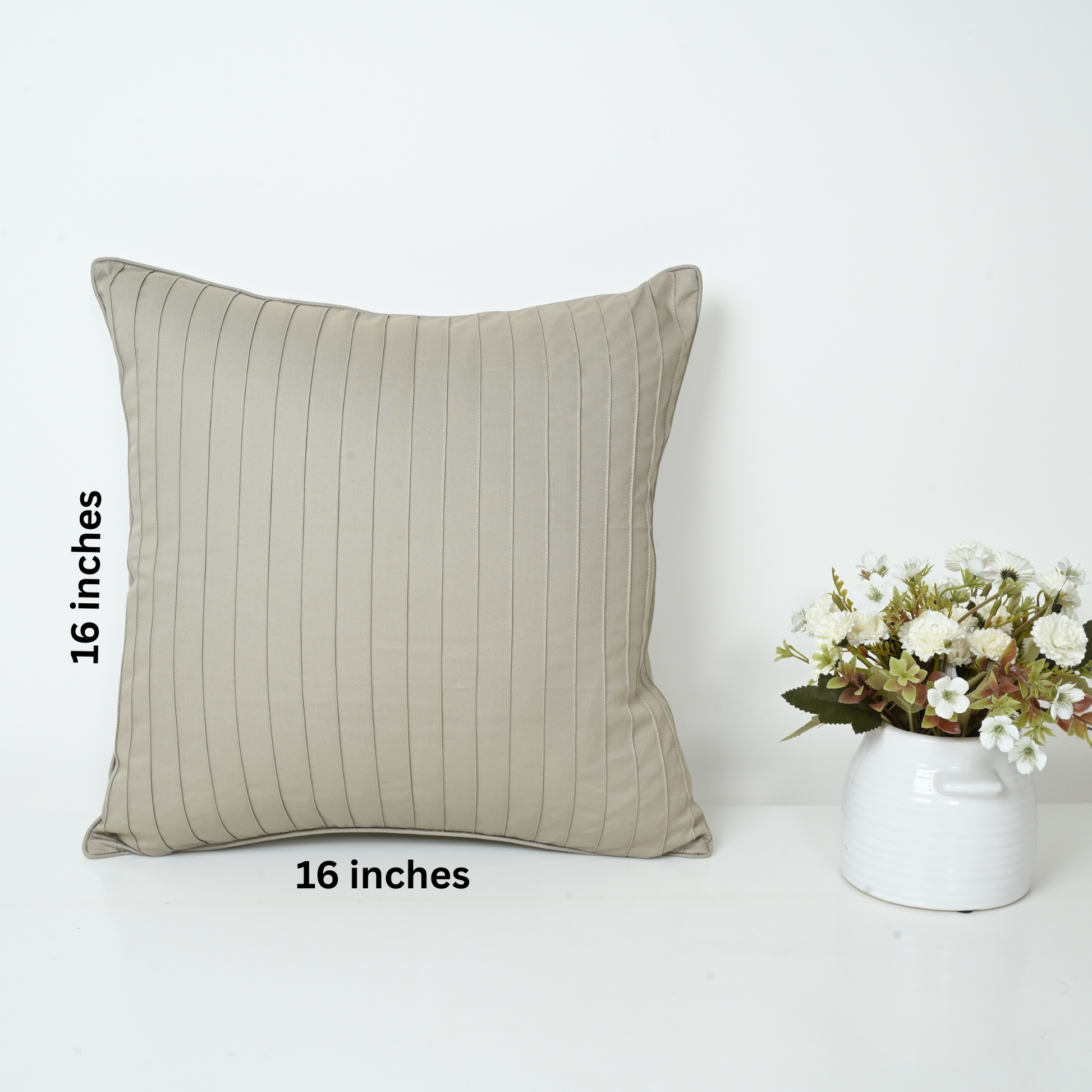 Beige striped pillow with dimensions .